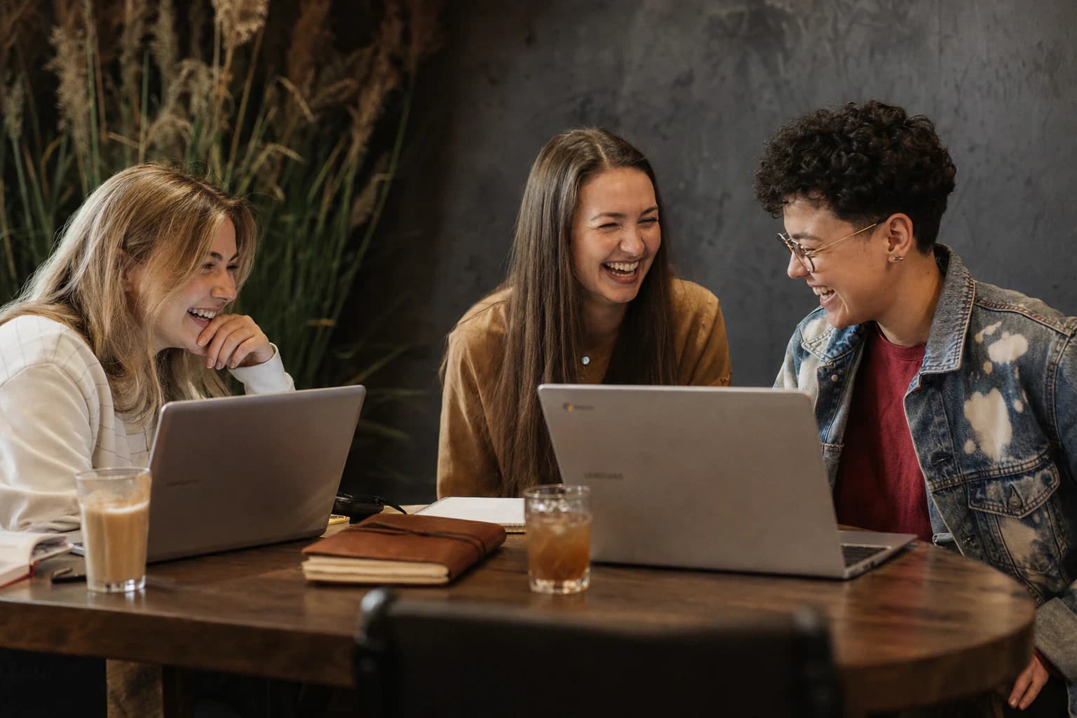 Students collaborating and laughing during a personalised mentorship session